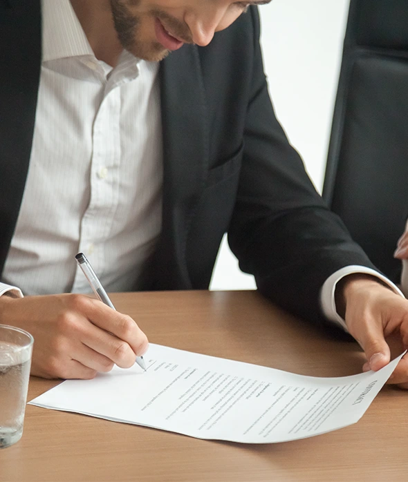 Man signing contract